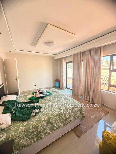 Neat 4 Bedroom Borrowdale Villas For Sale (Sole Mandate)