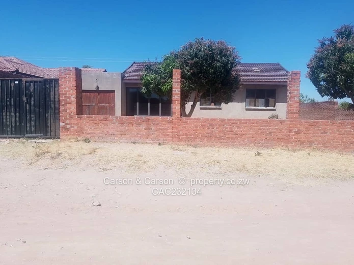 Walled 3-Bed Home with Verandah & Main Road Frontage