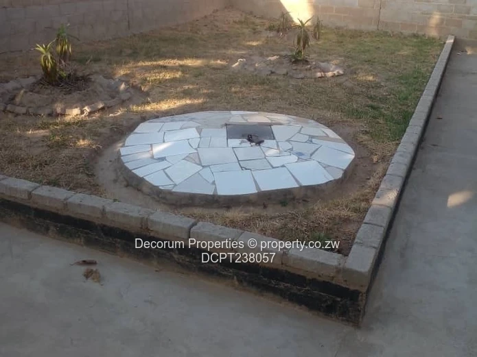 Chitungwiza: 2-Bed, 4-Bath Walled Brick Home, Paved Yard