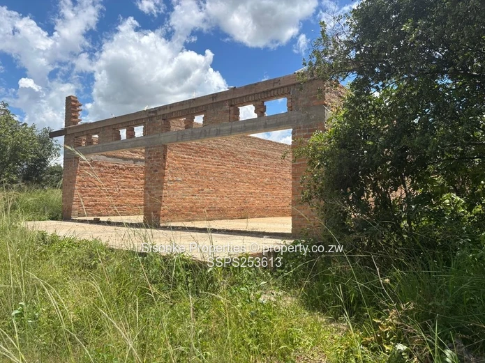 Incomplete brick retail shell on 300m² in  Murehwa