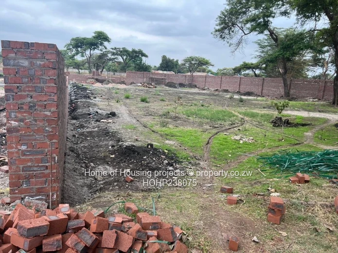 Prime 1000m² Walled Stand in Bluff Hill — Tarred Road & Sewer