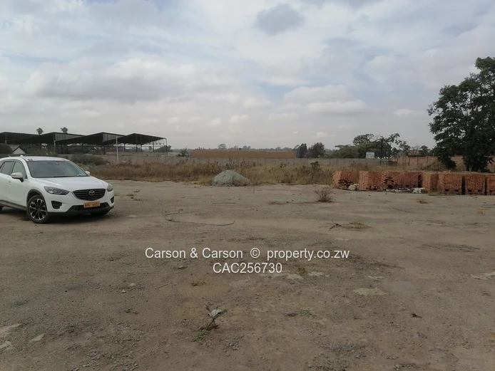 8001m² Walled Commercial Land — Main Road, Ardbennie, Harare South