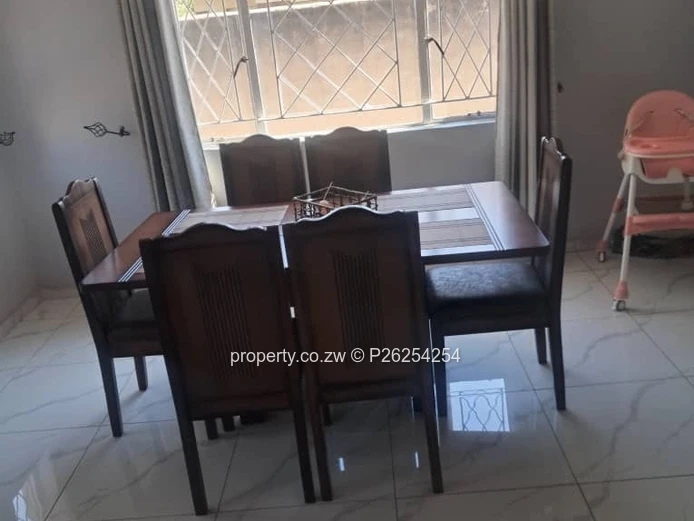 A four bedroomed house for sale in Mainway Meadows, Waterfalls in Harares