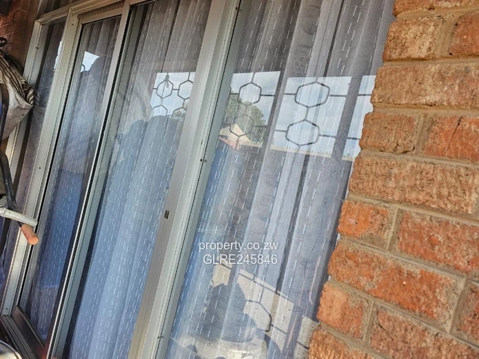 4-Bed Brick Home in Mkoba — Secure Verandah & Tank