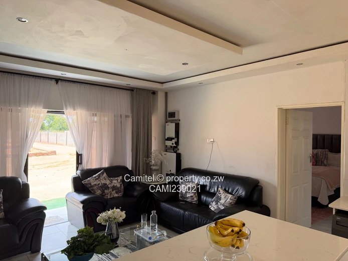 2100sqm Arlington stand with modern 2 bed cottage,gated community with clean title deed (Sole Mandate)