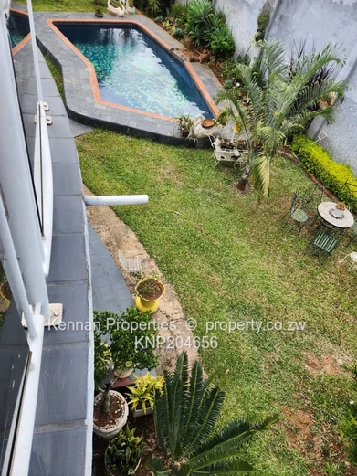Double Storey modern home with manicured garden