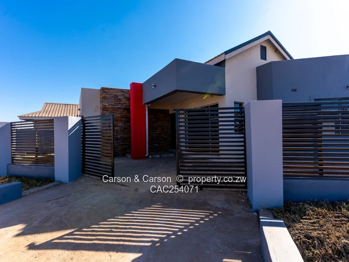 Modern 4-Bed Townhouse in Rainham — Grey & Red Accents, Pool