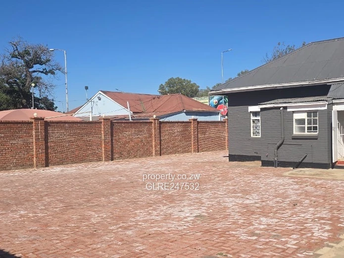 Harare CBD Office: Secure Walled Property with Paved Yard