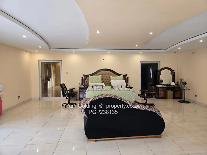 A grand palatial home- 8 bedrooms, 6 en-suite, Borehole, triple garages