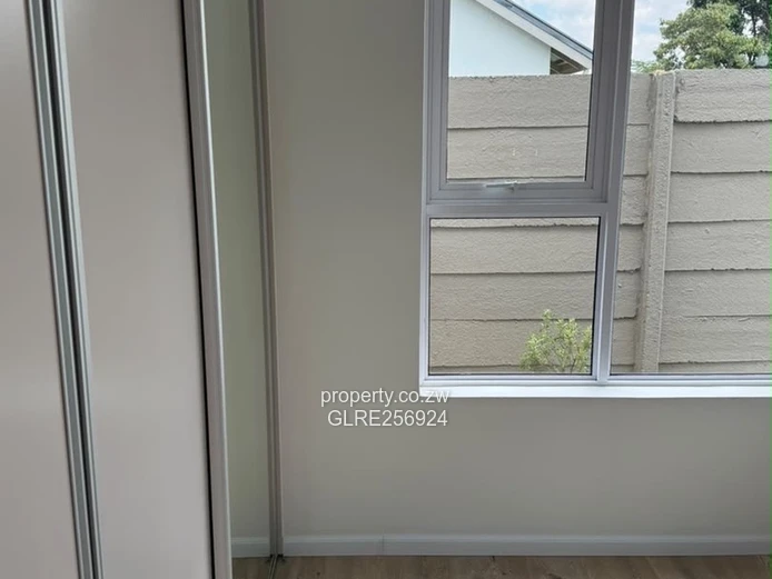 Modern 3-Bed Flat in Borrowdale with Verandah & Solar