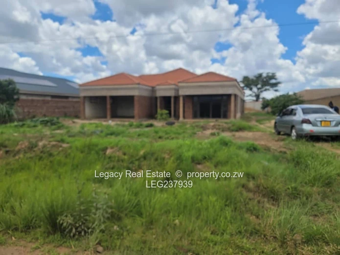 Prime Residential Plot with 4-Bedroom House to Complete