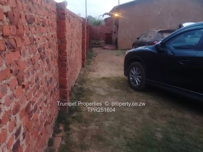 2-Bed Dzivarasekwa Ext— Walled 3 sides Yard, Parking, Sewer, Good ZESA
