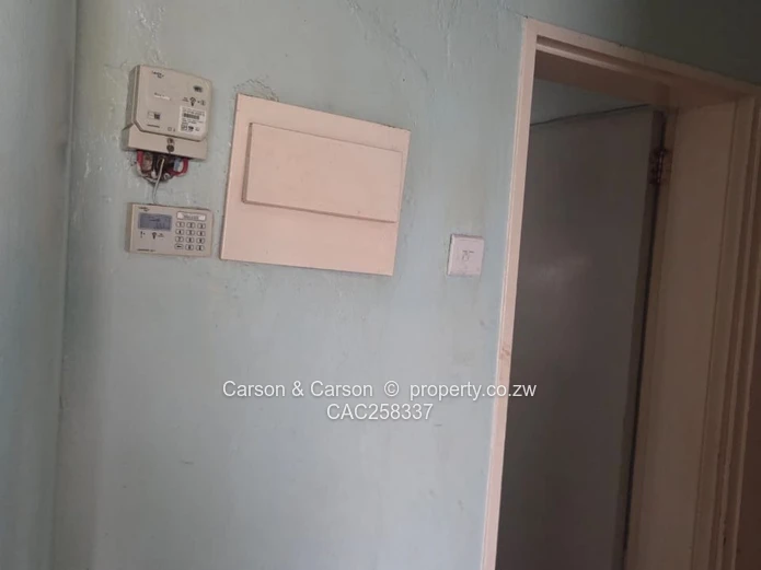 Mufakose 2 bedroom flat lounge fitted kitchen combined toilet and bathroom on ground floor 
