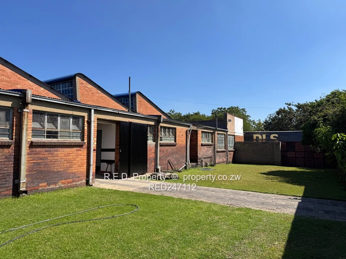Large-Scale Commercial Property with Extensive Warehouse and Business Space In Belmont!