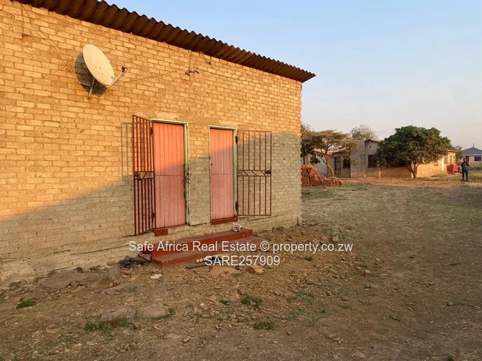 BUDIRIRO 5B TWO-ROOMED CORE-HOUSE-ON SERVICED STAND FOR SALE. Priced at US$