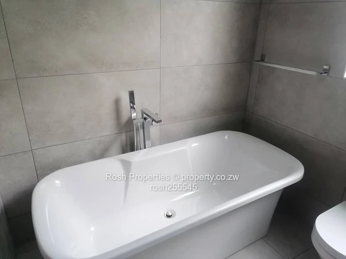 Modern 3-Bed Garden Flat in Borrowdale West with Borehole and Solar