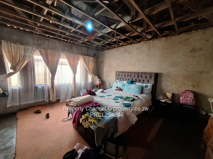 Solid 4-Bedroom Brick Home with Potential