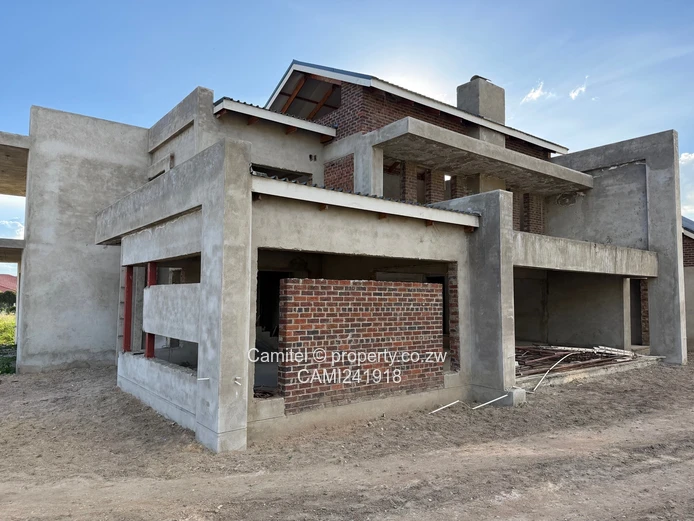 Incomplete 4 Bed double storey with a 3 bed cottage with title deed