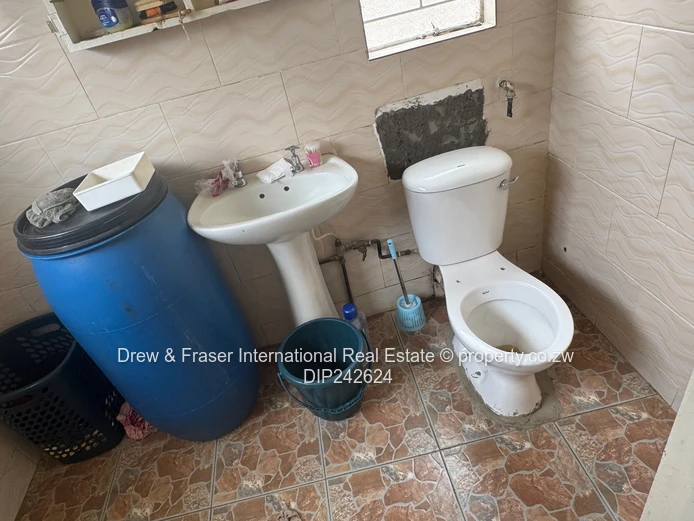 Unit L Seke 3 beds house with a cottage for sale