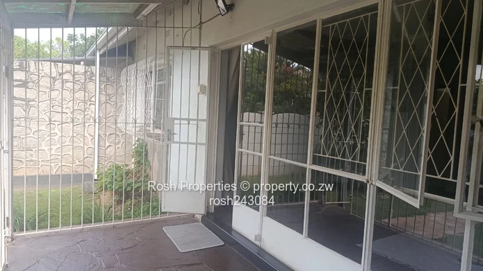 Avondale 2-Bed Garden Flat — Verandah & Borehole