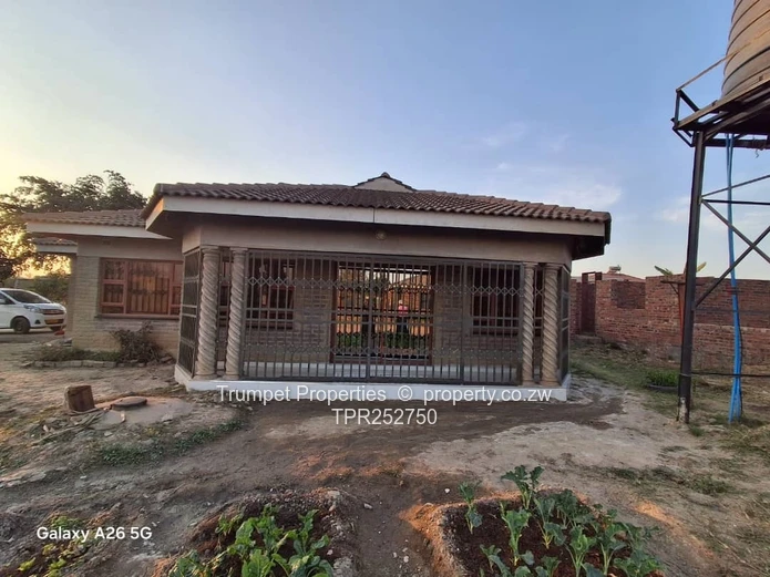 Spacious 7-Bed Home in Budiriro — Tank & Verandah