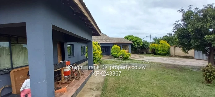Walled 6-Bed Home with Verandah & Garden — Msasa Park