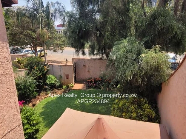 Baines & 3rd Avenue Garden Duplex For Sale