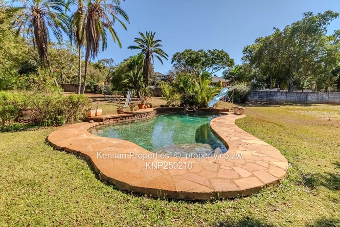 Attractive five bedroom home on two and a half acres. Good water and Msasa trees. (Sole Mandate)