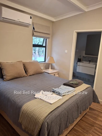 Chisipite 2-Bed Townhouse — Pool, Garden & Balcony