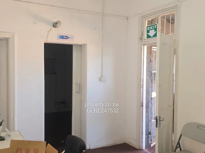 Harare CBD Office: Secure Walled Property with Paved Yard