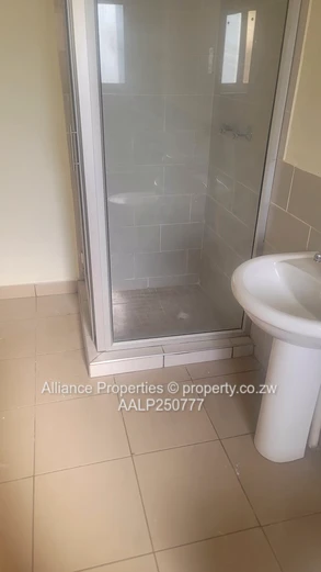 Spacious 2-Bed Ground Floor Flat with Borehole & Garden