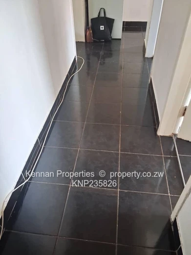 Secure 2-bedroom flat close to Avenues Hospital and Shops.