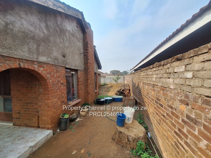 Solid 4-Bedroom Brick Home with Potential