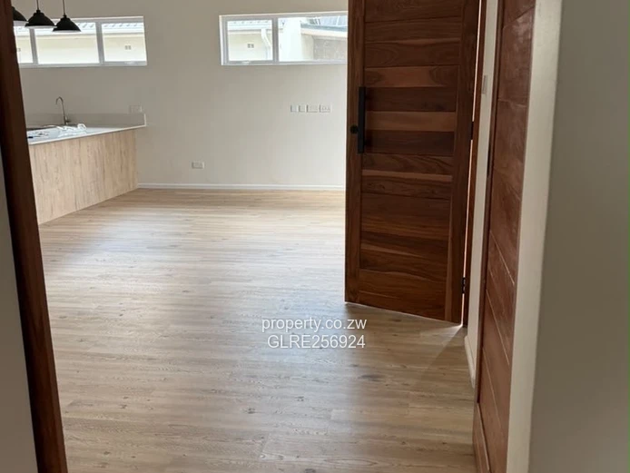 Modern 3-Bed Flat in Borrowdale with Verandah & Solar