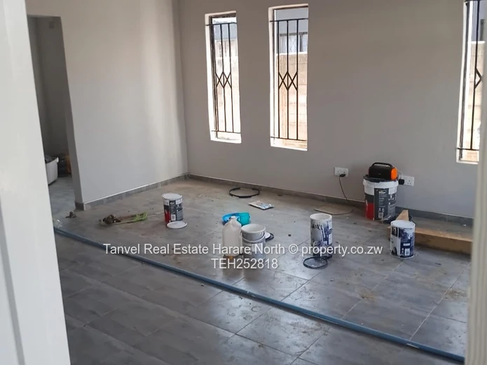Available for Sale in Warren Park D is a neatly refurbished house with 5 Bedrooms, Lounge and kitche