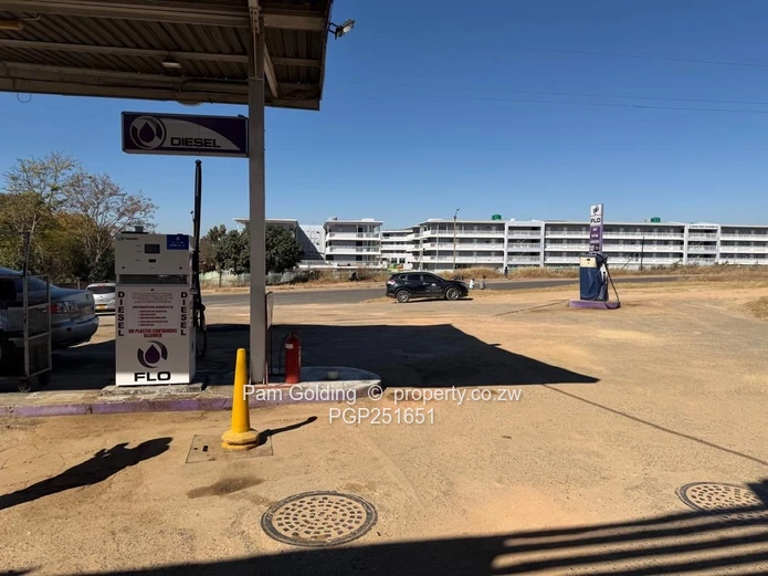 Multi - use service station and retail hub