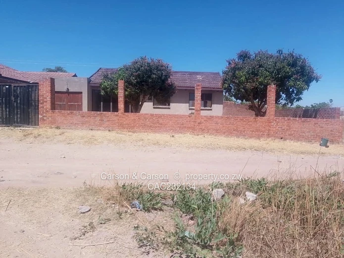 Walled 3-Bed Home with Verandah & Main Road Frontage