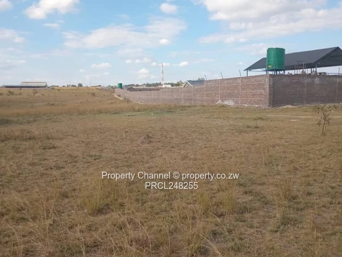 5,000 sqm Level Plot in 8km west of Gweru CBD — Open Grass, Adjacent Walled Property
