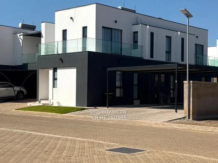 Contemporary 4-Bed Borrowdale Apt — Balcony & Borehole