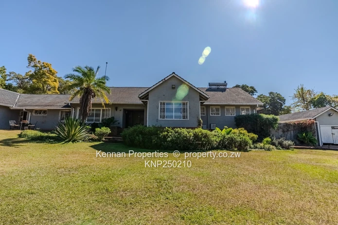 Attractive five bedroom home on two and a half acres. Good water and Msasa trees. (Sole Mandate)
