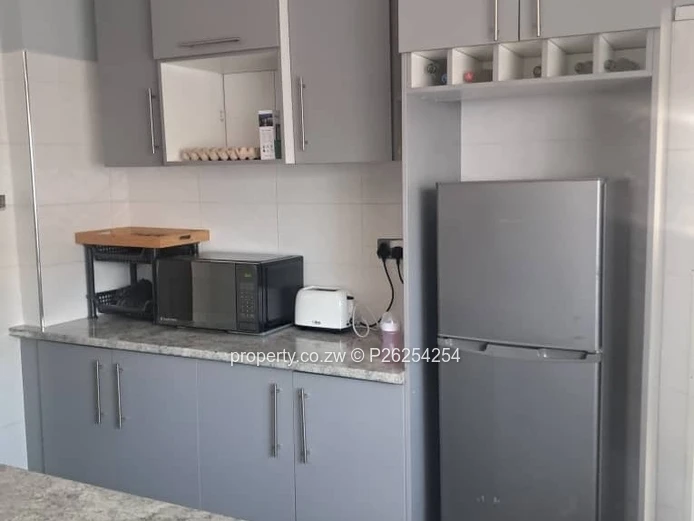 A four bedroomed house for sale in Mainway Meadows, Waterfalls in Harares