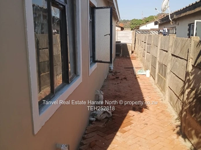 Available for Sale in Warren Park D is a neatly refurbished house with 5 Bedrooms, Lounge and kitche
