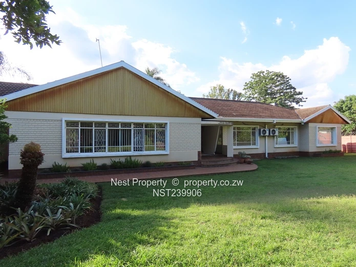 Neat, Embassy Style Home located in the heart of Gunhill!