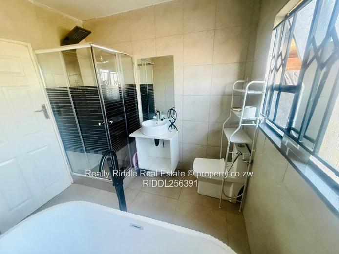 Budiriro 4-Bed House — 3 Baths, Freestanding Tub