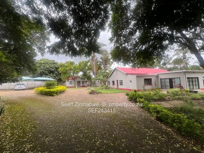 Commercial Property With Cottage & Staff Quarter