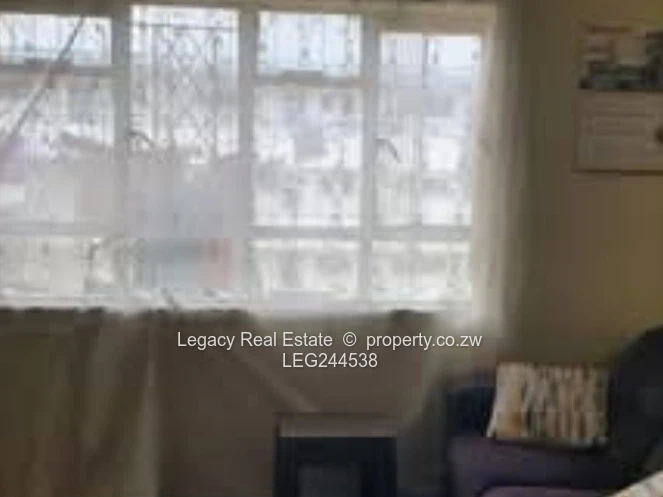 Secure Avenues Flat With Borehole & Parking