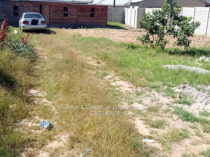 Secure Walled 450m² Stand with Gate on Gravel Road, Chitungwiza