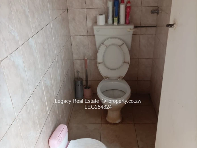 Cozy 3-Bed Warren Park Home with Borehole & Verandah (Sole Mandate)