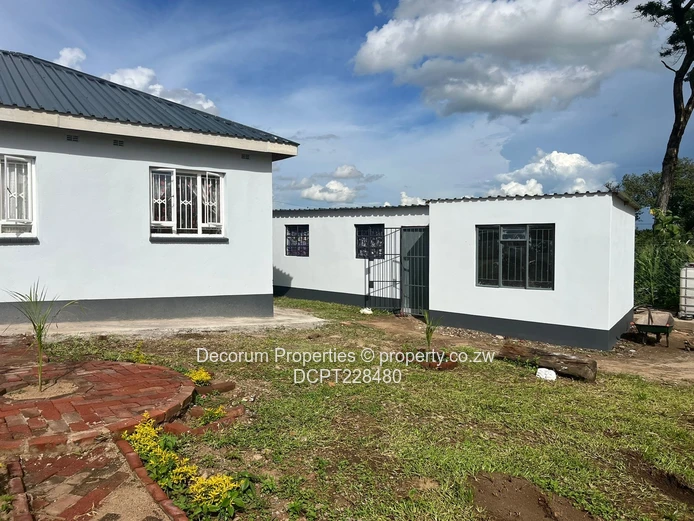A 3 bedroom cottage with borehole for sale
