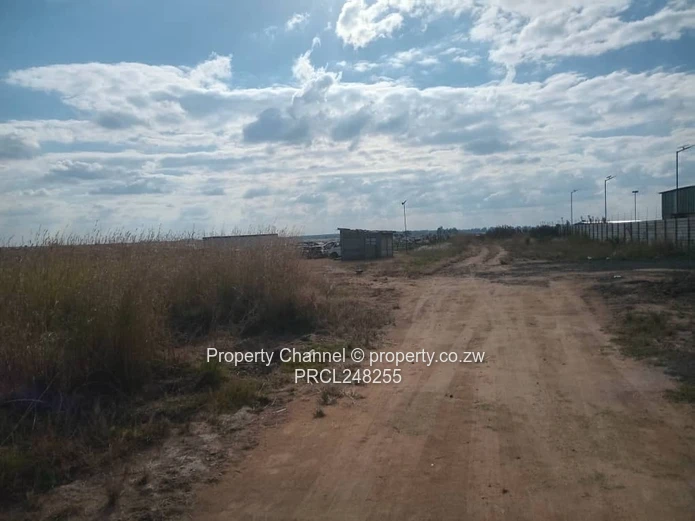 5,000 sqm Level Plot in 8km west of Gweru CBD — Open Grass, Adjacent Walled Property